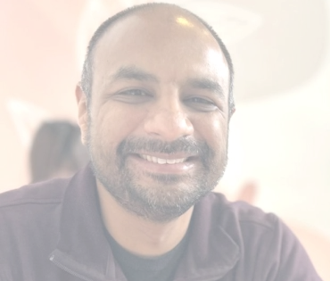 Hiren P., who supported his brother through life with Huntington’s disease (HD) and now dedicates himself to raising awareness for the HD community.