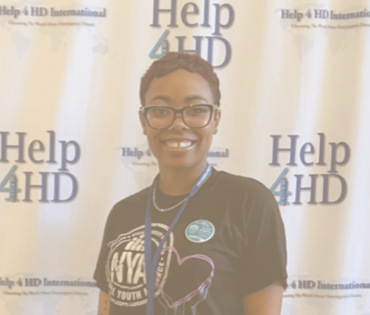 Rashawnda J., living with Huntington's disease (HD), finds connection and support while attending an event dedicated to raising awareness for HD. 