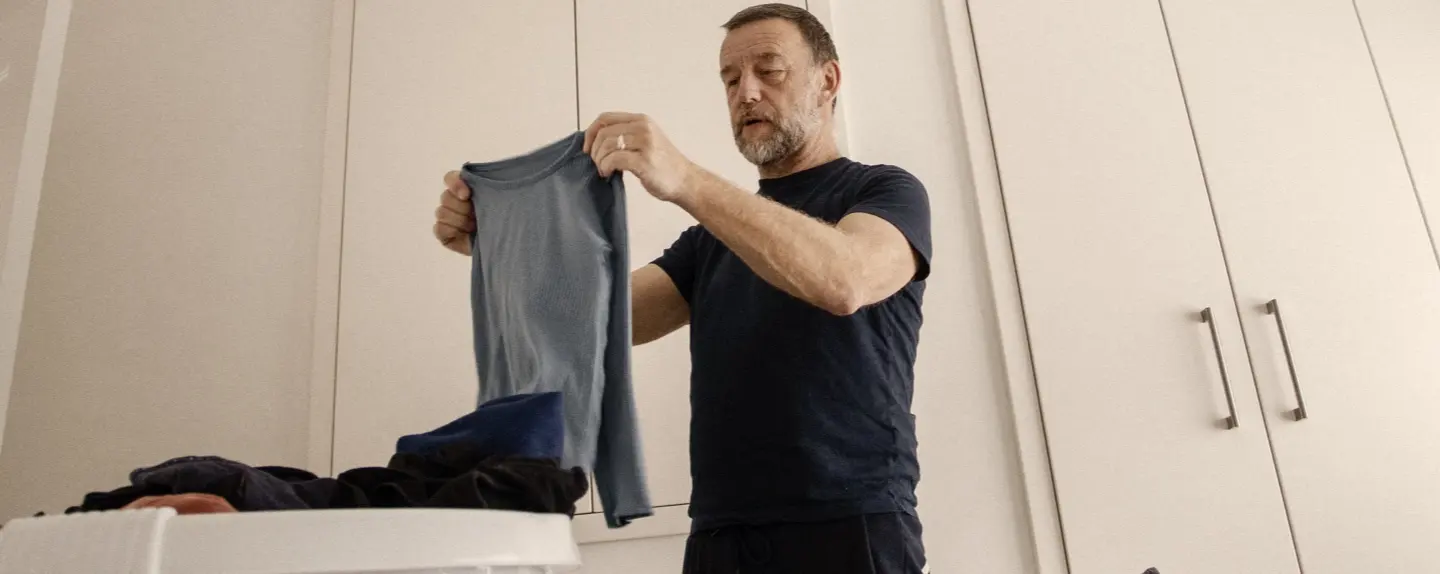 Everyday tasks, like folding laundry, can be difficult with symptoms of Huntington's disease (HD) chorea.