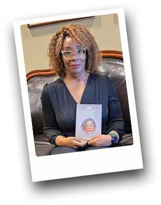Tanita posing with her book “We Exist”.