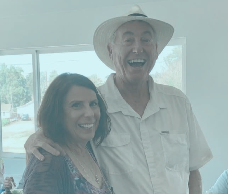 Therese C-M and her husband, who she cared for throughout his journey with Huntington’s disease (HD). 